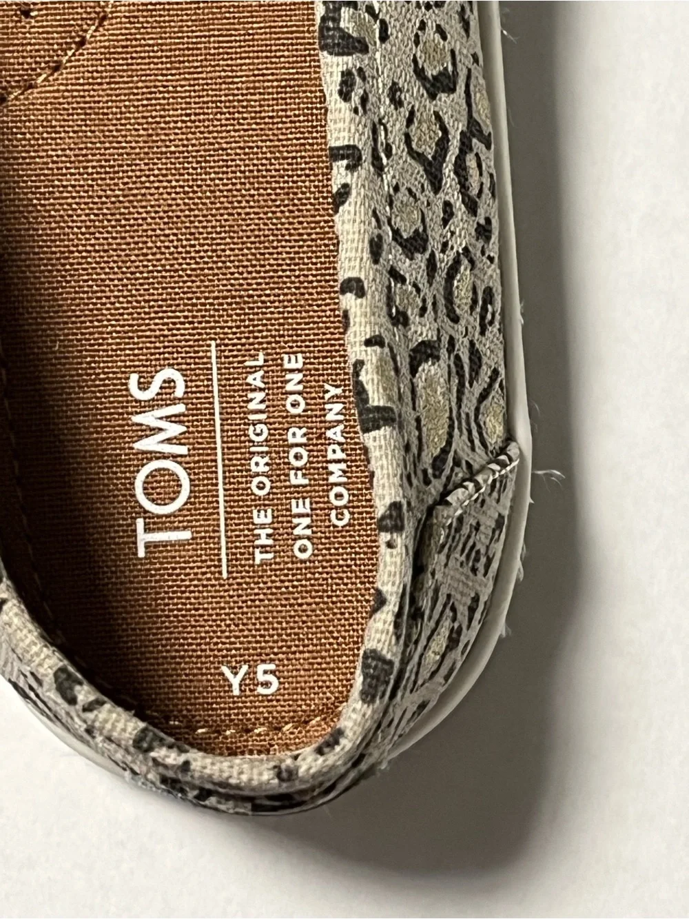 TOMS Kids Leopard Print Slip-On Shoes in Tan and Black Size Y5